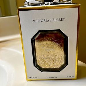 Victoria secret bombshell nights perfume 3.4 oz  never opened it used
